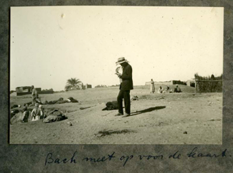 Figure 5: “Bach taking measurements for the map” with Egyptian co-workers at the background. Photograph taken at Qau from Henri Frankfort’s 1922-23 photo album. Courtesy of the Egypt Exploration Society