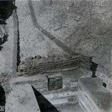 Photograph showing excavation of the tomb no. 302 at el-Riqqa, both during the works and afterwards. Engelbach 1915: plate II fig. 6.