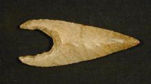 Neolithic flint arrowhead recovered during excavations directed by Gertrude Caton-Thompson with funding from the Royal Anthropological Institute.